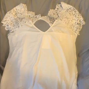 White shirt with lace detail and leggings